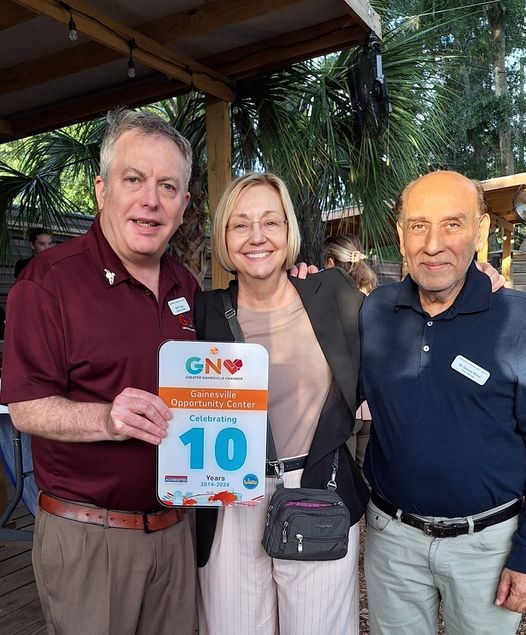 Photo of GOC Development Director Brett Buell, Executive Director Margie Foster, and Board member Shoab Rana